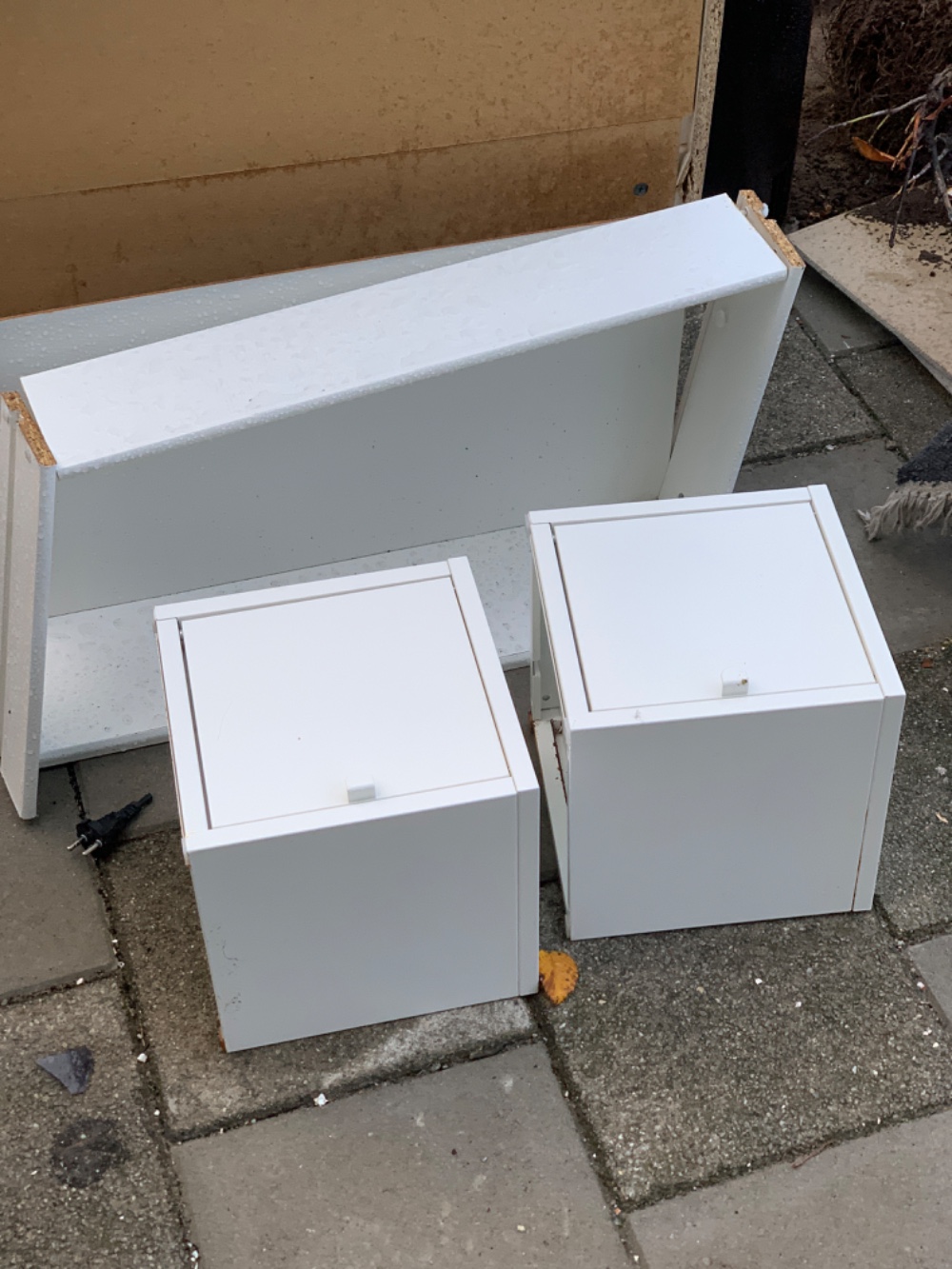 Two metal cubes/boxes