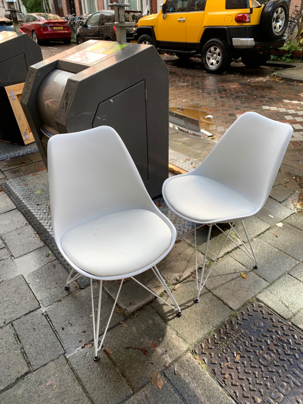 Two white ikea chairs