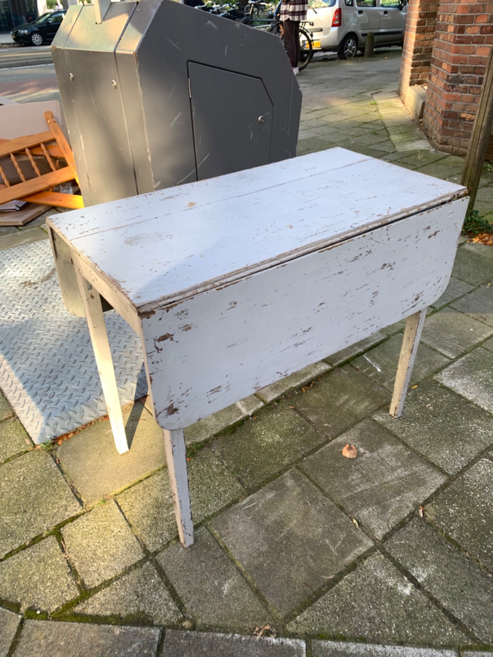 Old folding table. In a rough shape, but stil functional. Need some love