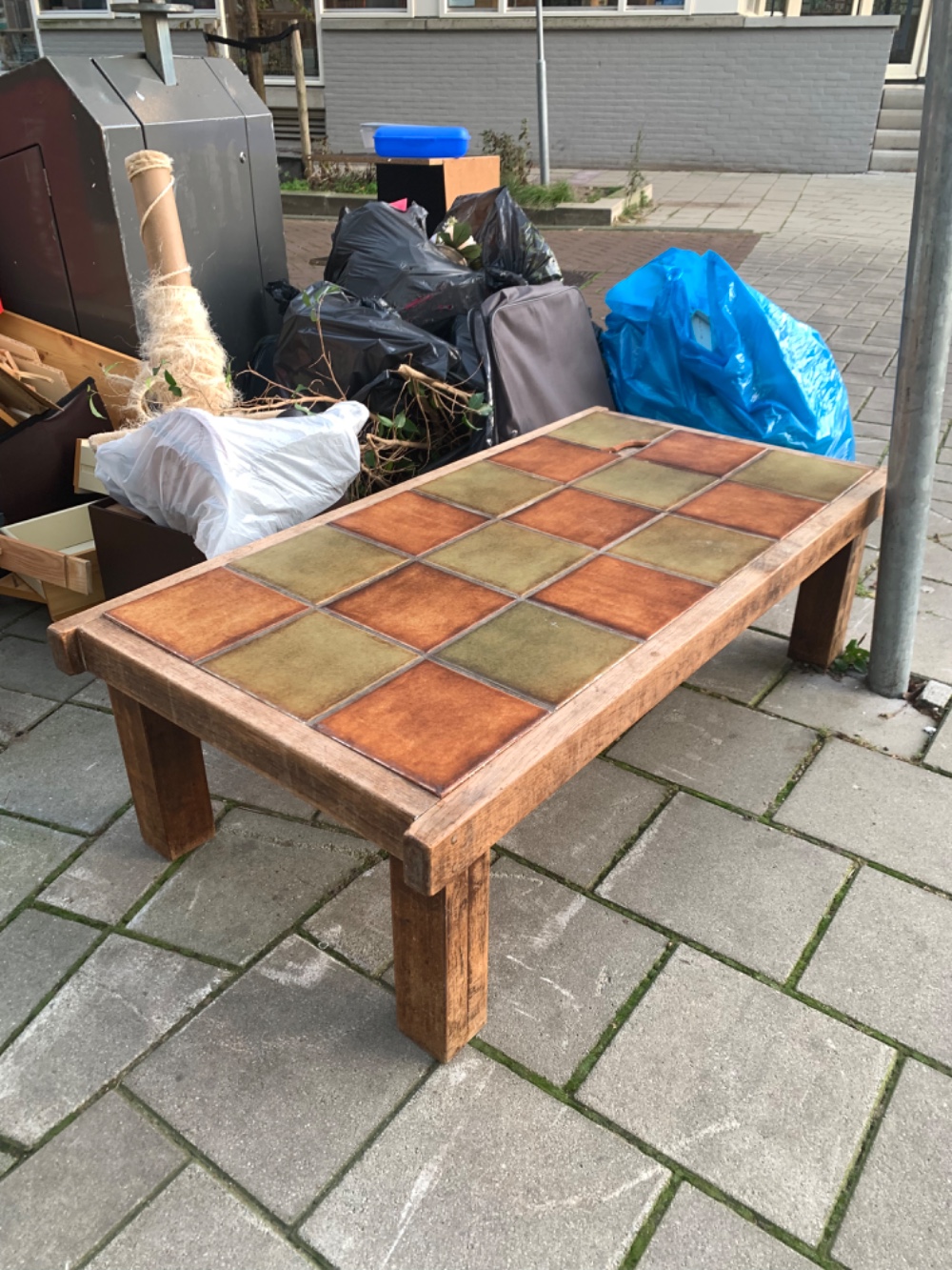 Wooden sofa table with ceramic tiles on top