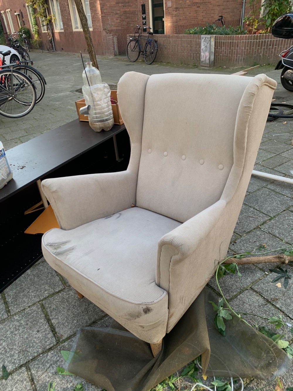 An armchair, quite dirty