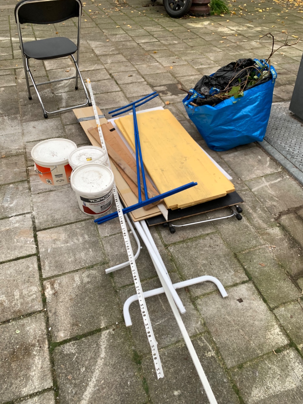 Two folding chairs (one a the bottom of the pile) and a clothes rail photo 2