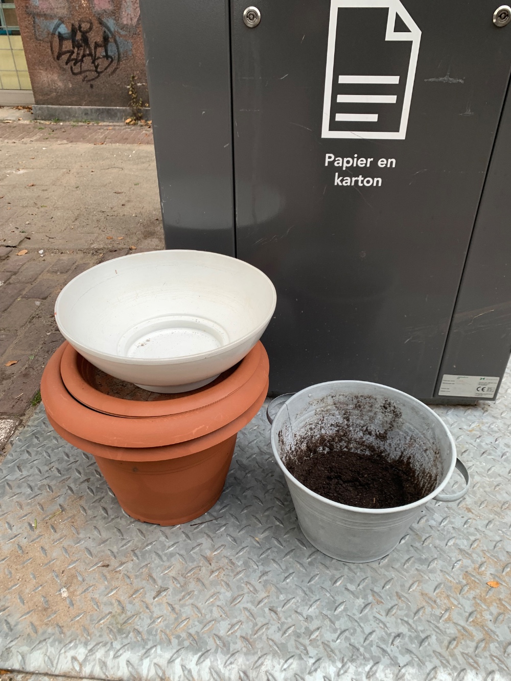 Two large plant pots
One large ceramic plate
One metal bucket