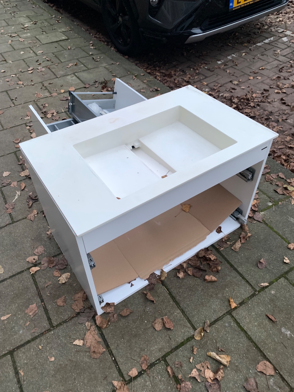 A sink with a cabinet