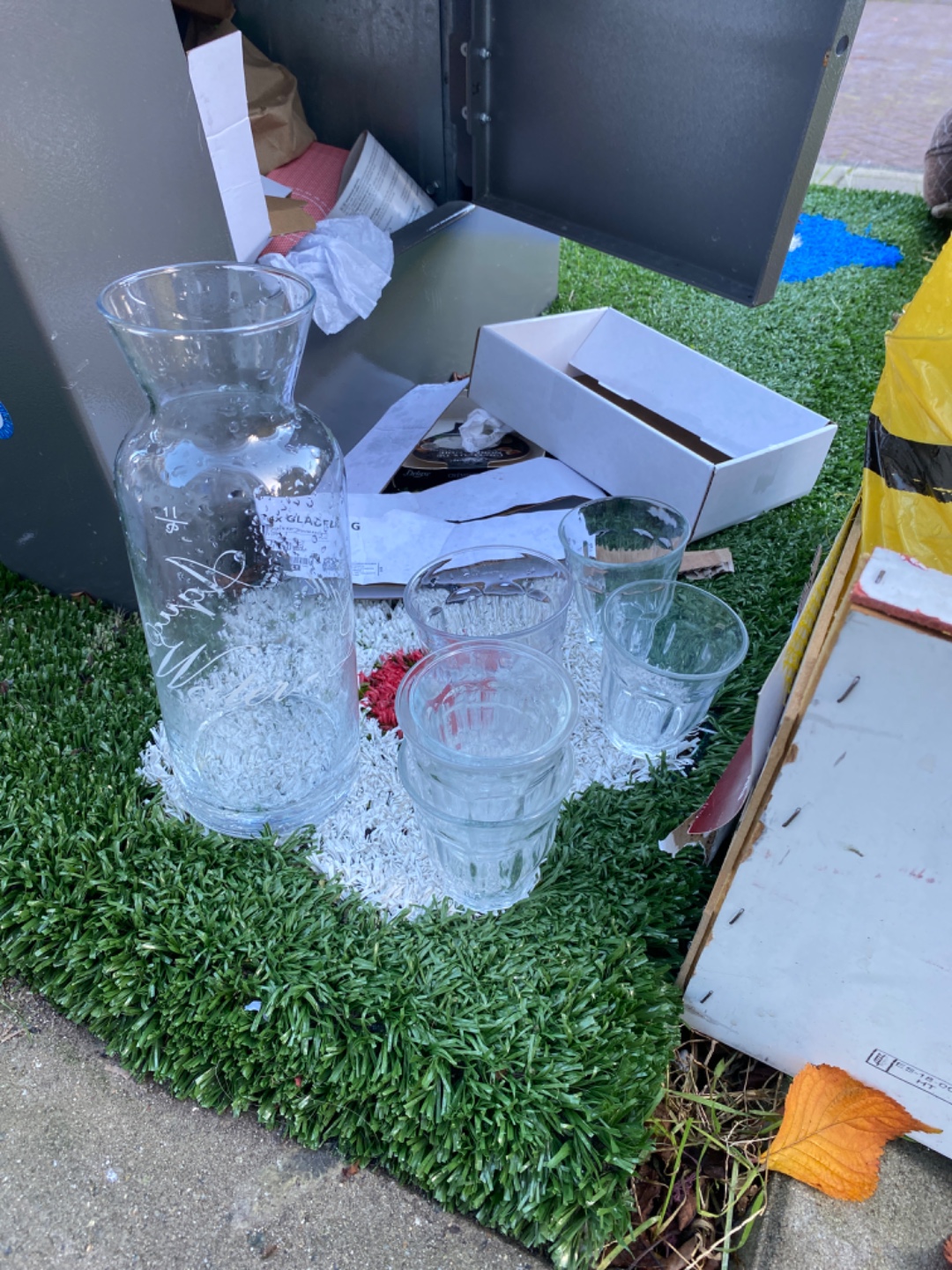 Many tea and water glasses, a jar and a jug