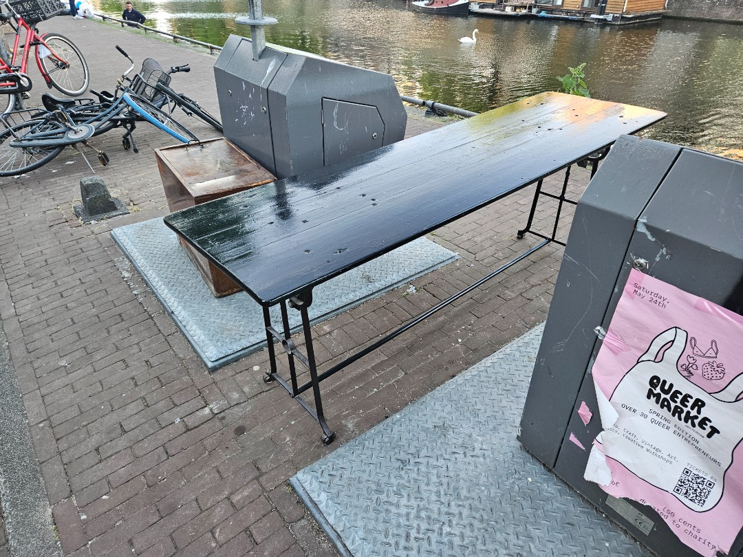 Black wooden table with metal frame photo 2