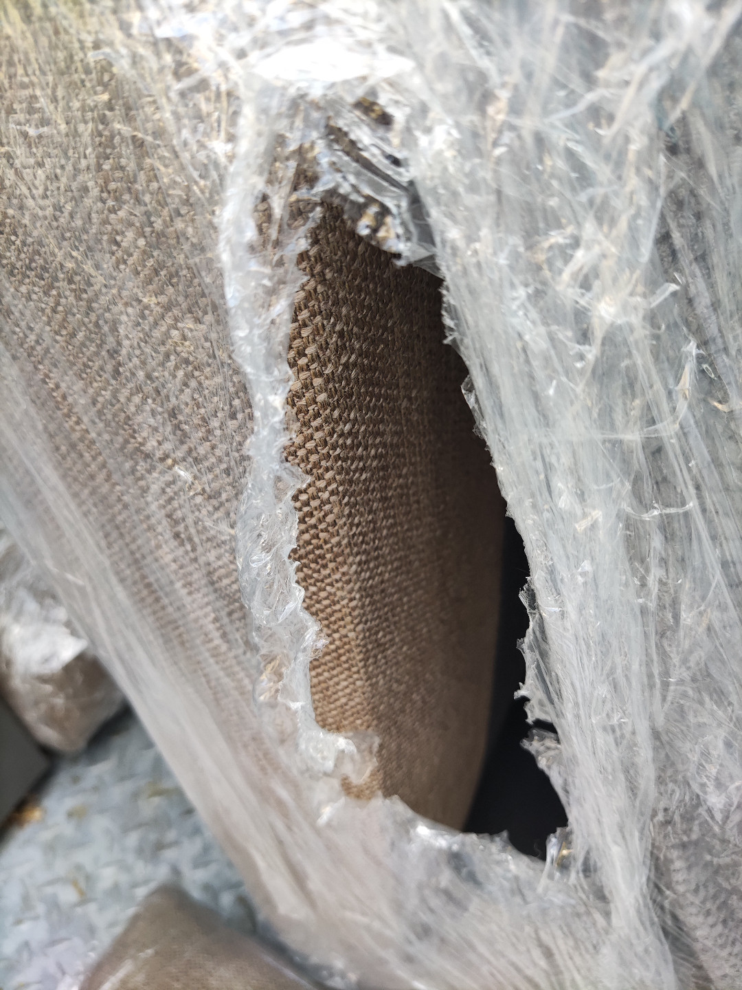 Shrink-wrapped corner sofa, presumably in good condition. photo 2