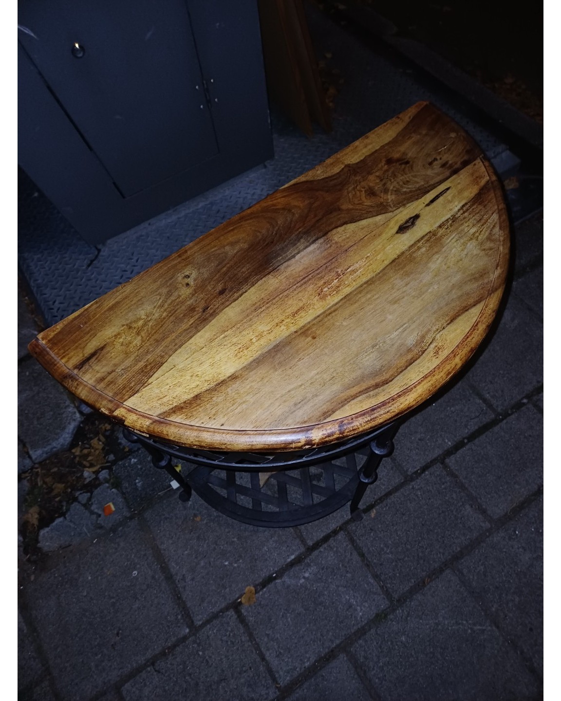 Really nice solid wood and metal half moon table, maybe like 50/60ish cm wide. Pretty heavy. photo 2