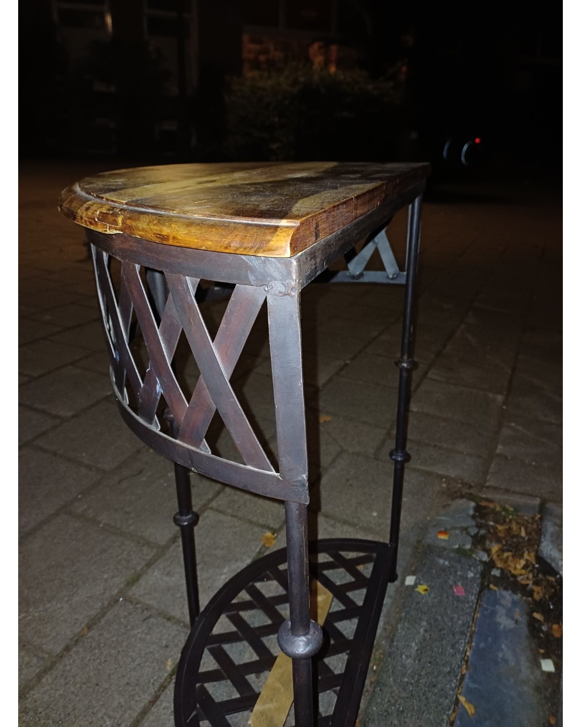Really nice solid wood and metal half moon table, maybe like 50/60ish cm wide. Pretty heavy. photo 3