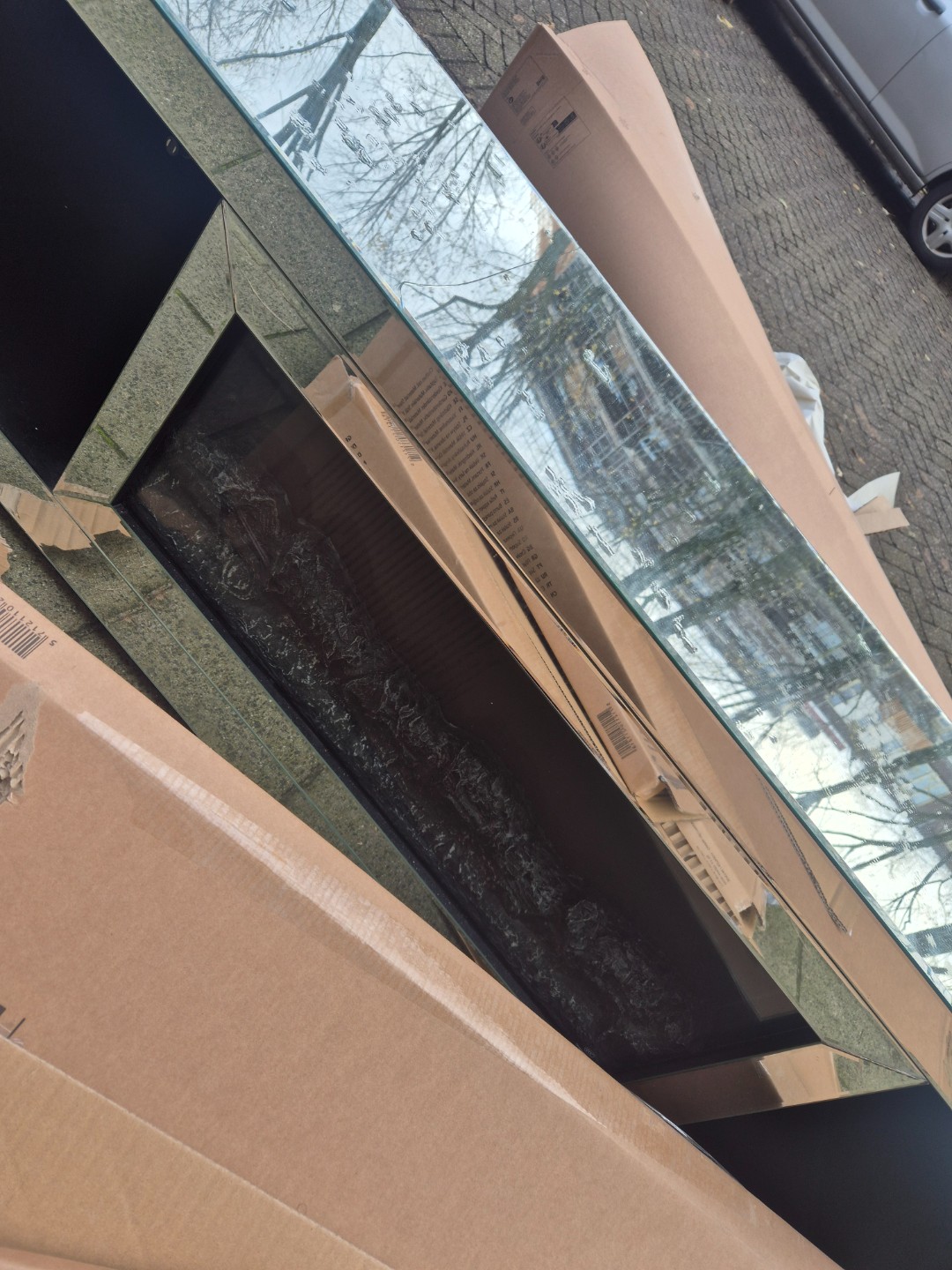 Tv meubel van spiegels? Met een haardvuur erin? photo 2