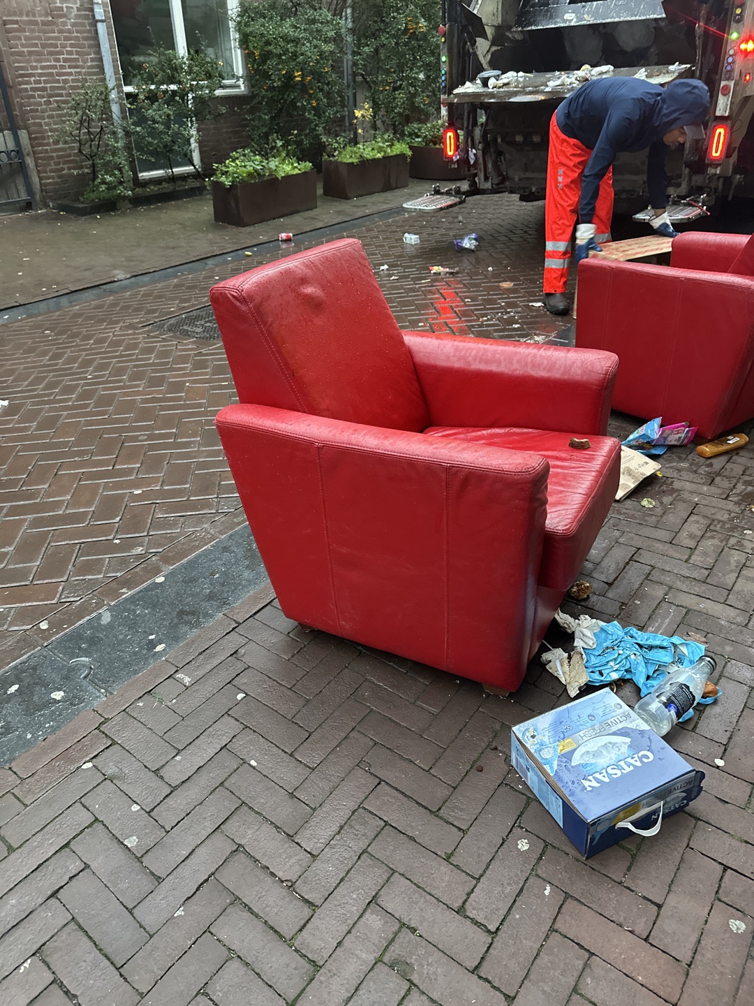 2 red leather chairs