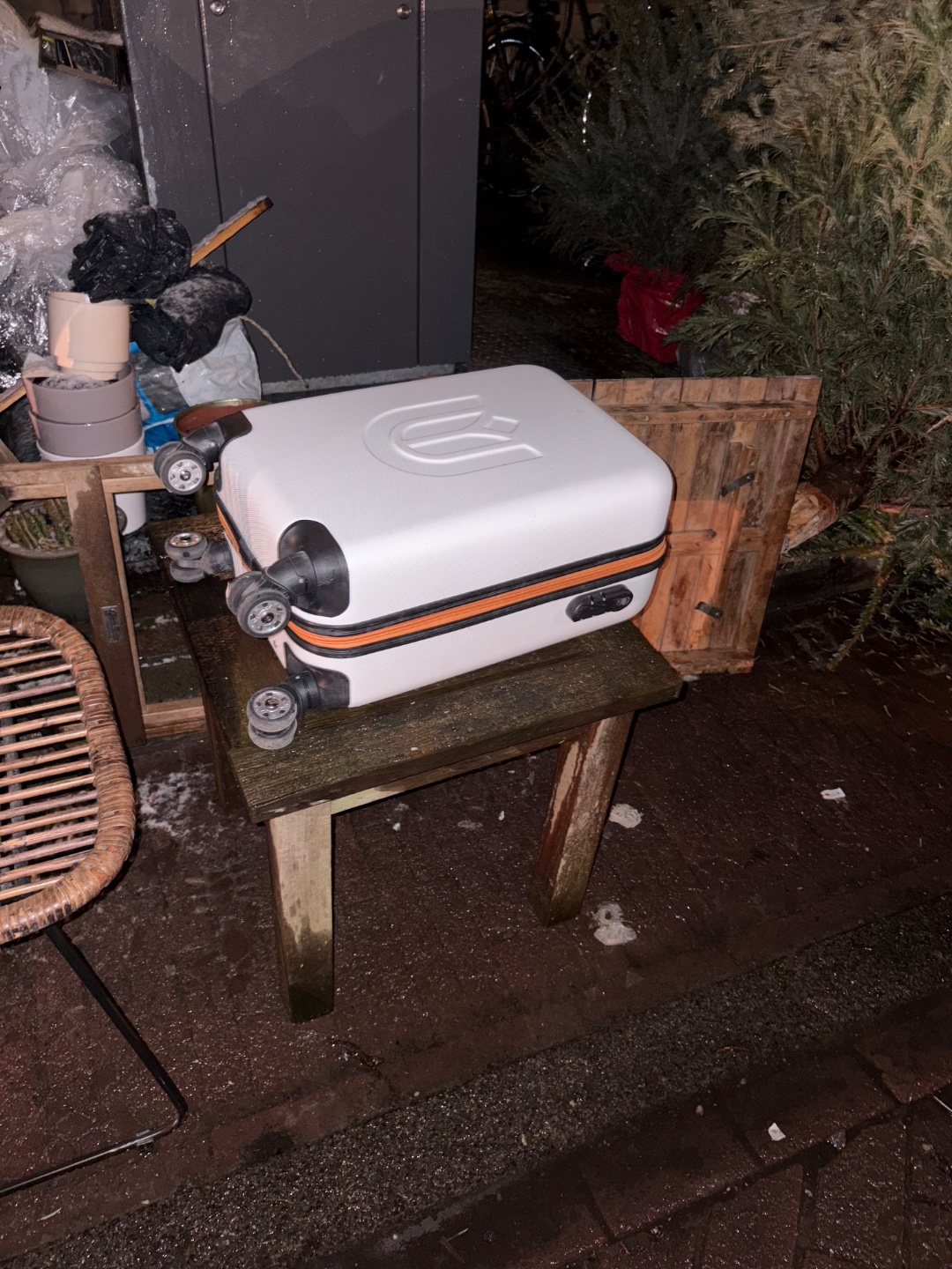Suitcase and wooden table photo 1