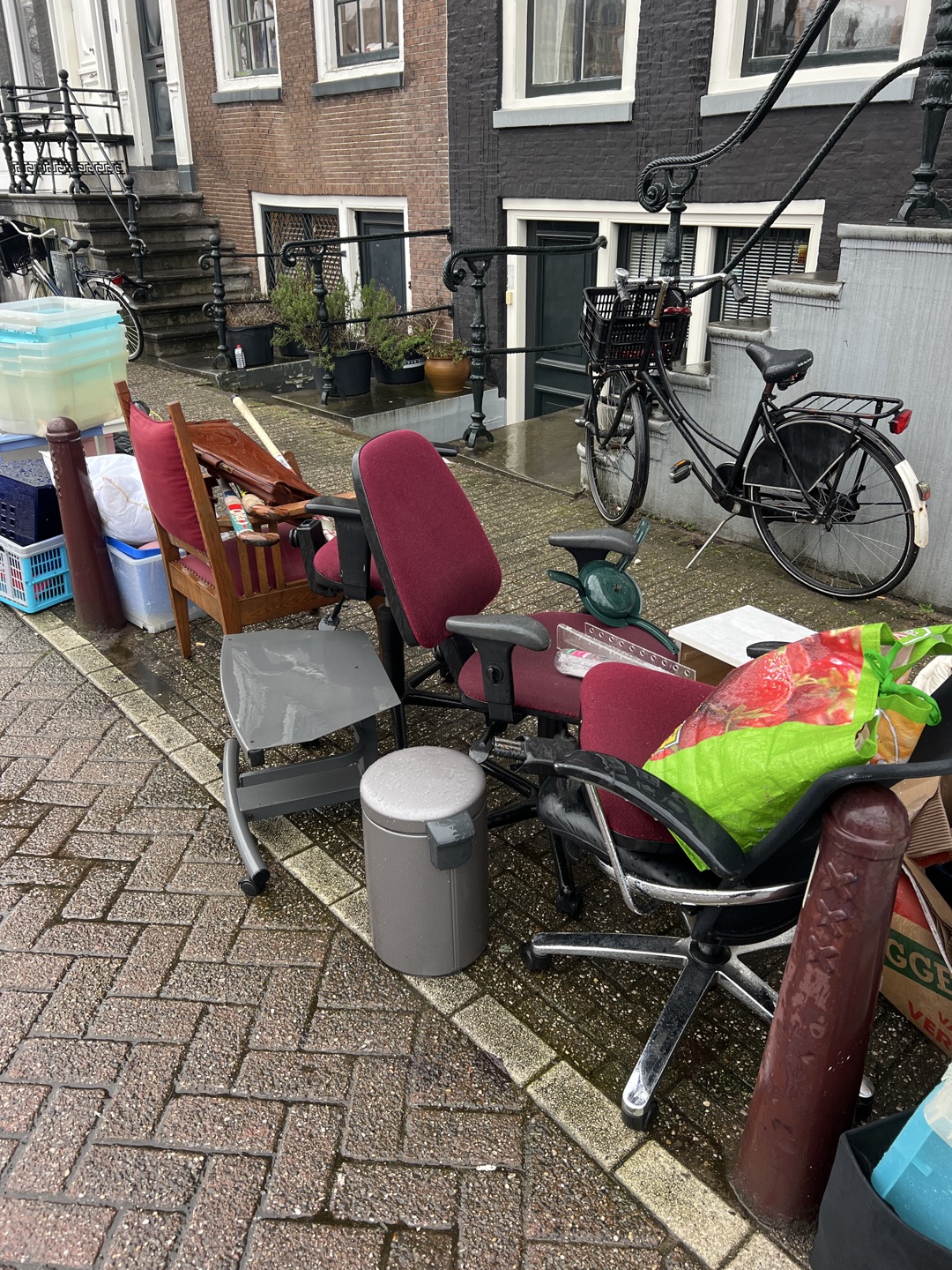 Some chairs, briefcase, hockey sticks photo 1