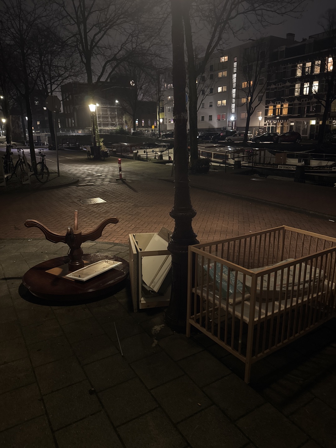 Table, some shelving and a crib photo 1