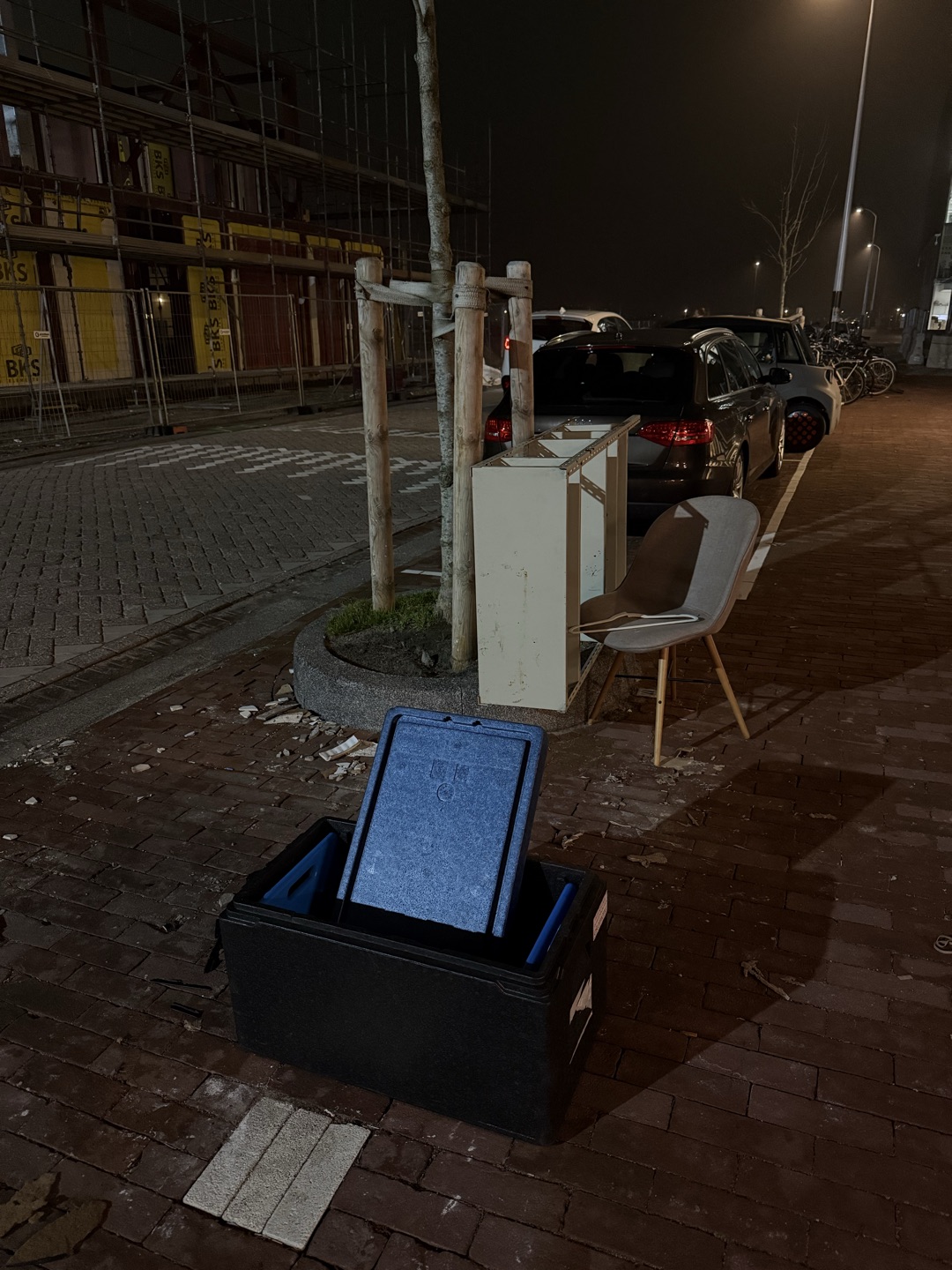 Clean Insulated cooler box (for food) including ice packs a chair, and open shelving unit. photo 1