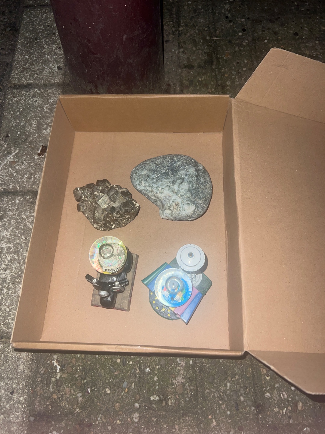 2 snow globes, a rock and a crystal. photo 1