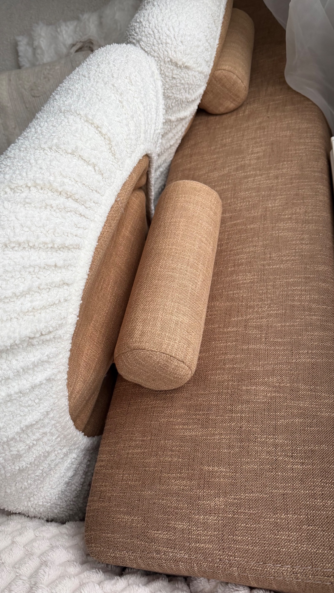 This Roche Bobois couch is up for taking! We wrapped it ourselves with a white teddie material, the original couche is brown/sand color. There are some damages on the side and bottom caused by our cat, but nothing noticeable if placed against a wall :) perfect for a student house photo 2