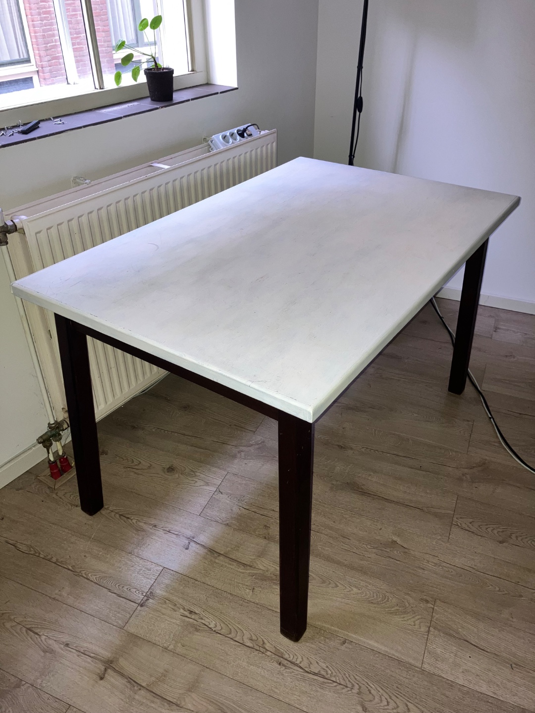Wooden table 123x80 cm, top painted white. Legs are screwed off. 
Nees to go today or tomorrow 
Please DM photo 1