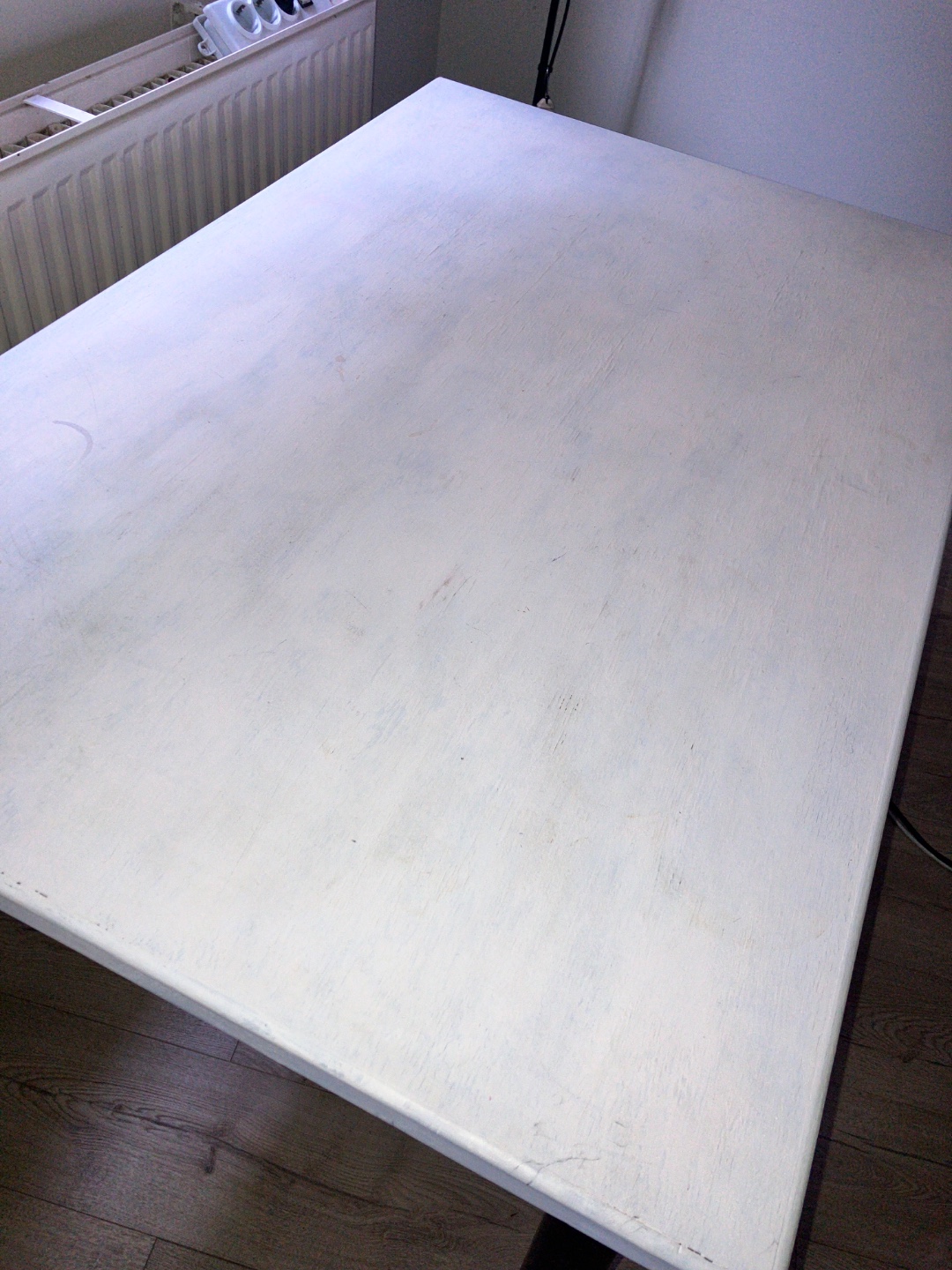 Wooden table 123x80 cm, top painted white. Legs are screwed off. 
Nees to go today or tomorrow 
Please DM photo 3