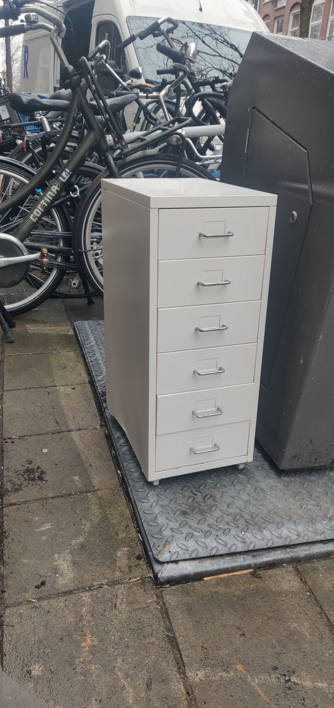 Chest of drawers. Has a dent in the side and small signs of rust, but looks overall still usable. photo 1