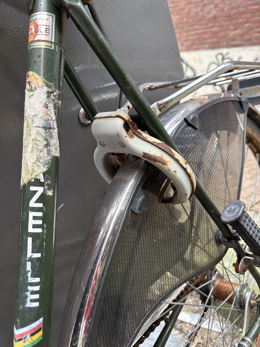 Gazelle bike, a bit beaten up and locked, but free photo 3