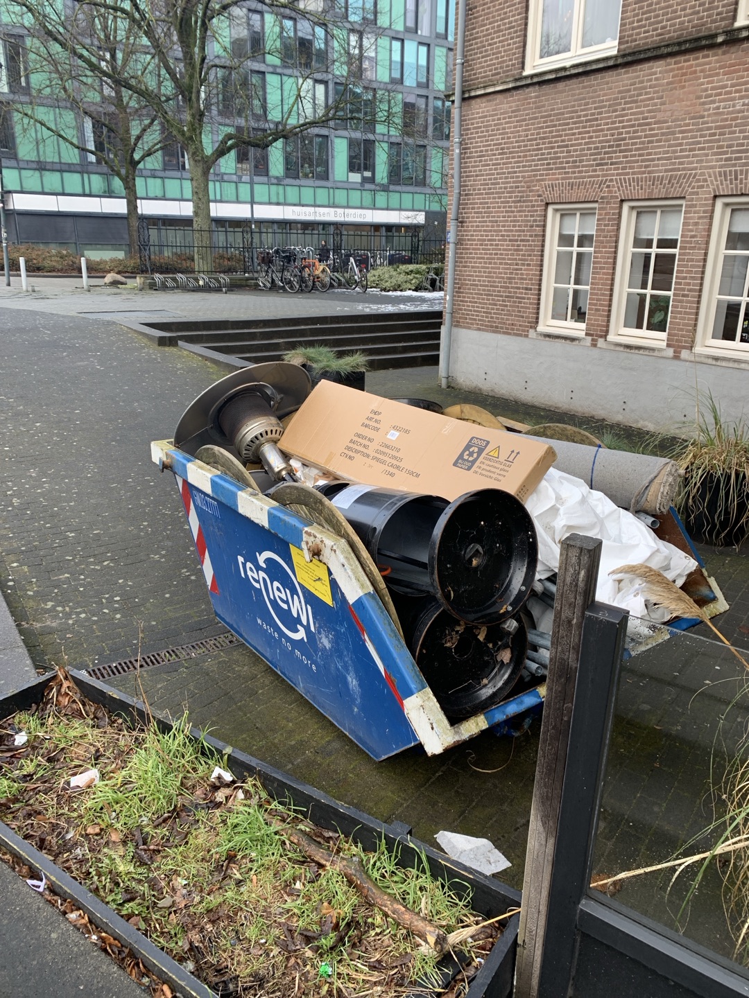 Outside heater, tables, cool trash can