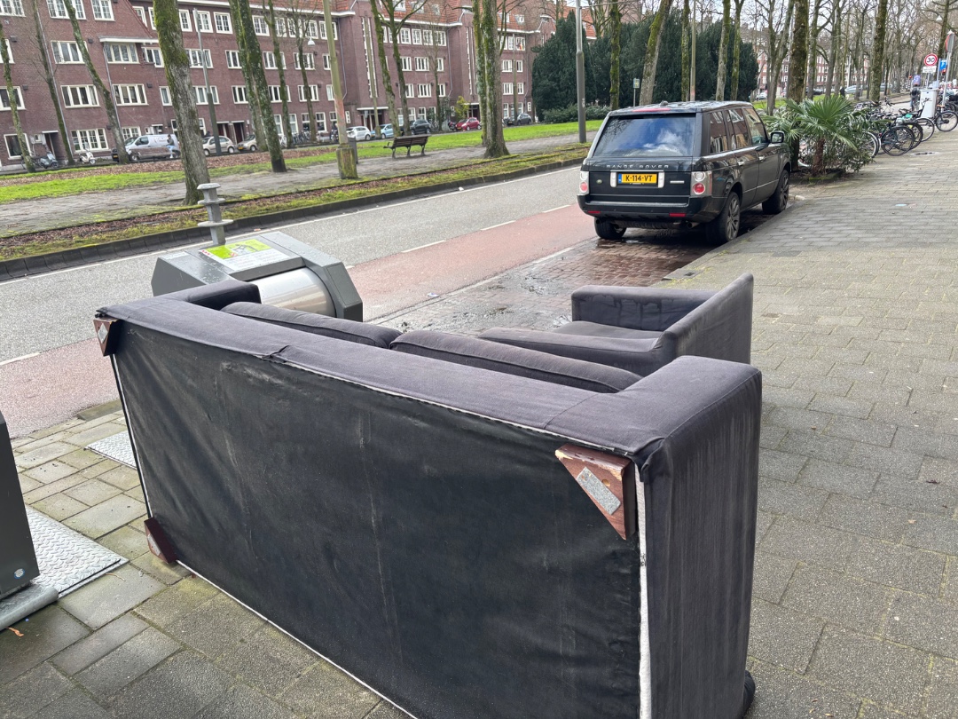 Large and comfy looking couch hopefully not too damaged by the rain photo 3