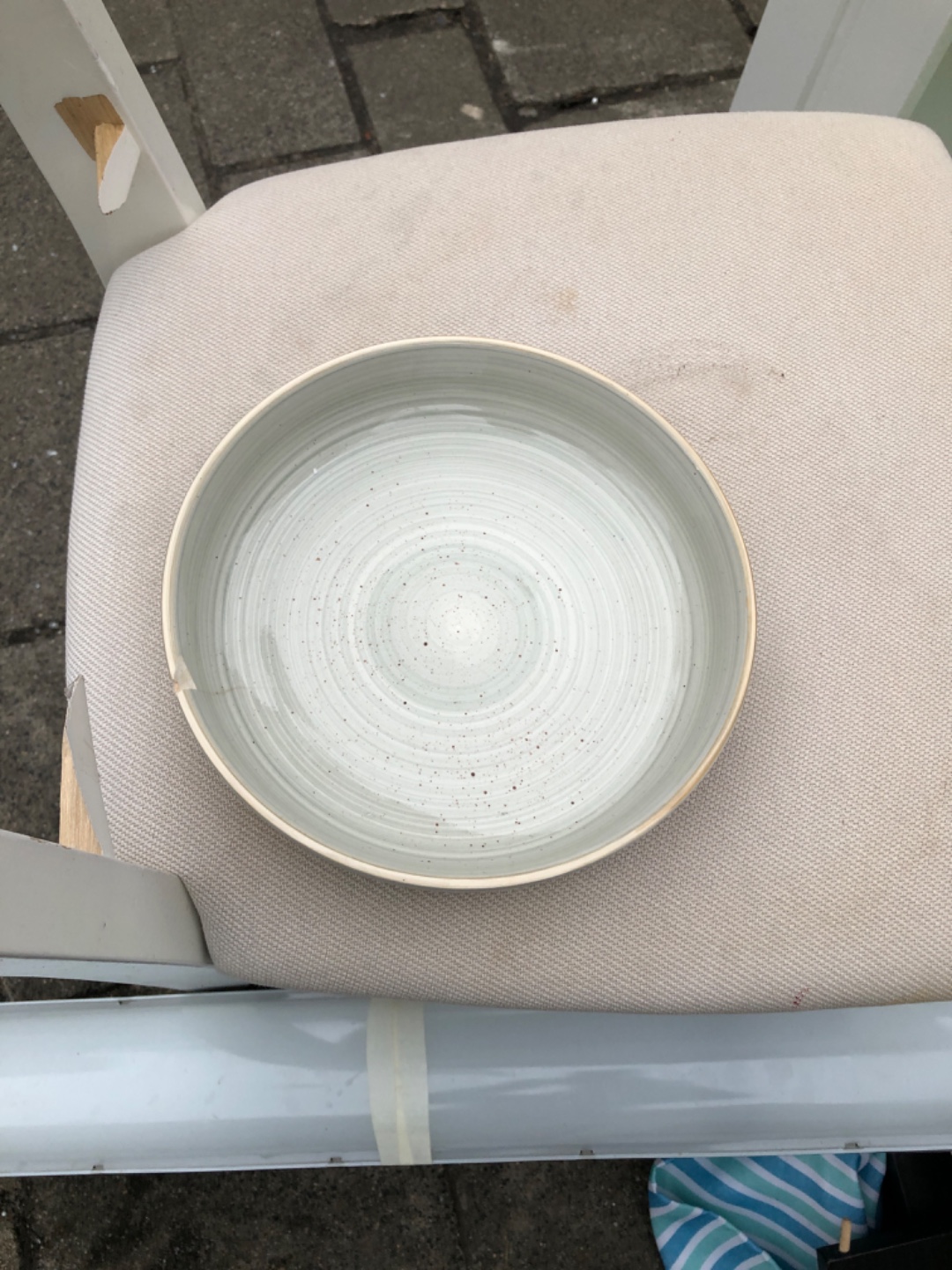 Glasses two chairs a plate, a black seat under the matras and a reed blind photo 2