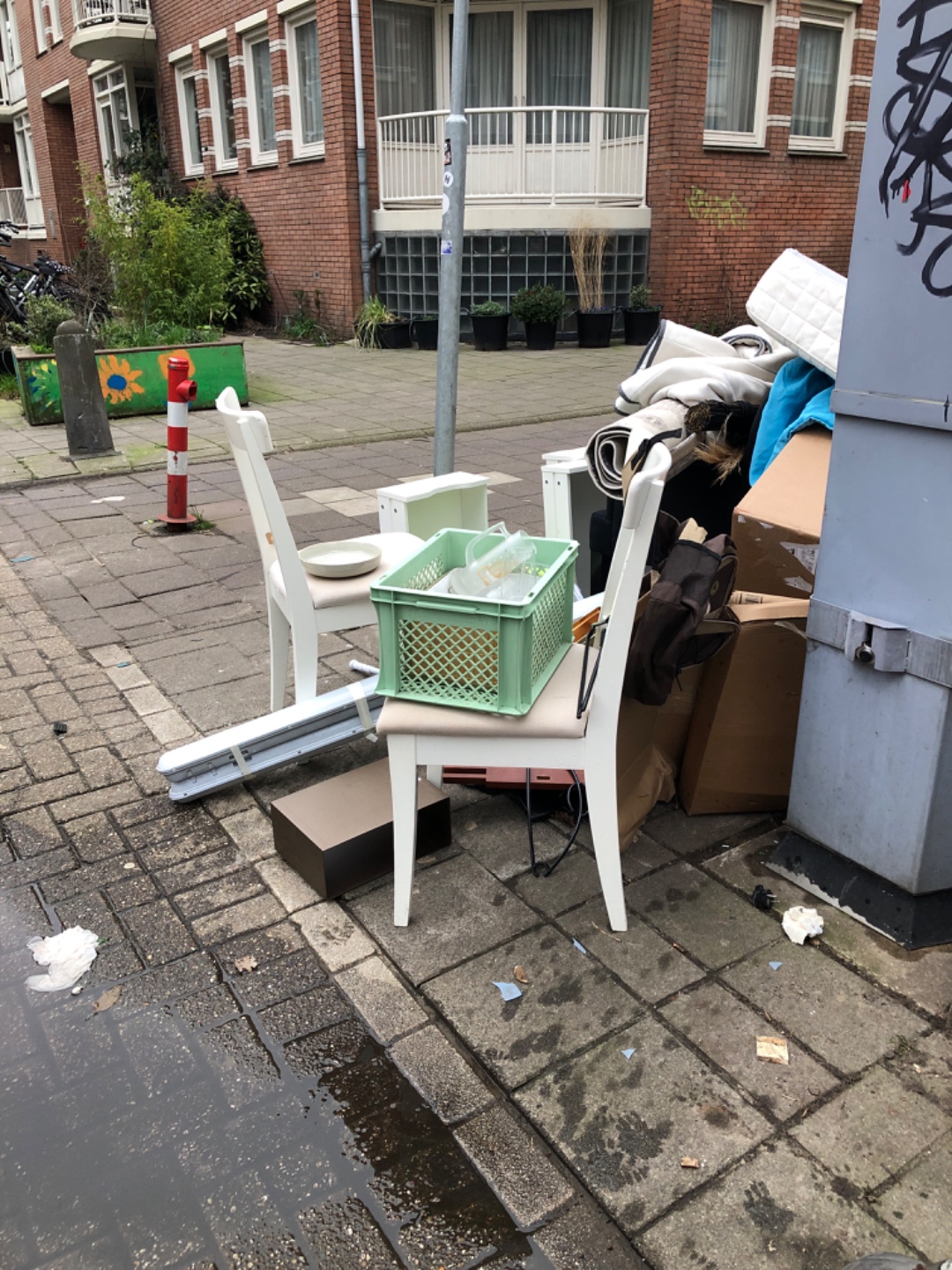 Glasses two chairs a plate, a black seat under the matras and a reed blind photo 3