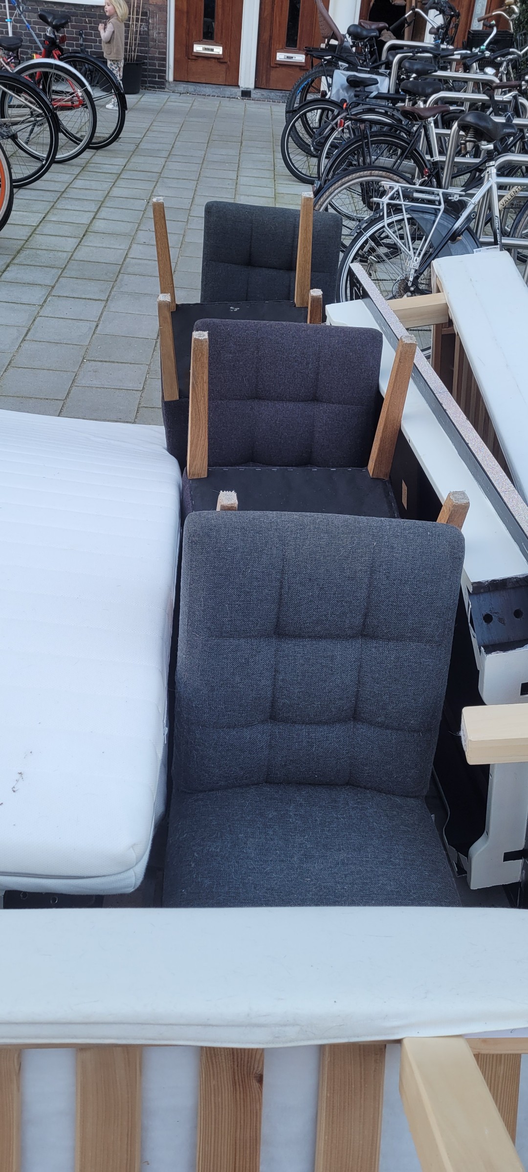 6 deining chairs and a trashcan