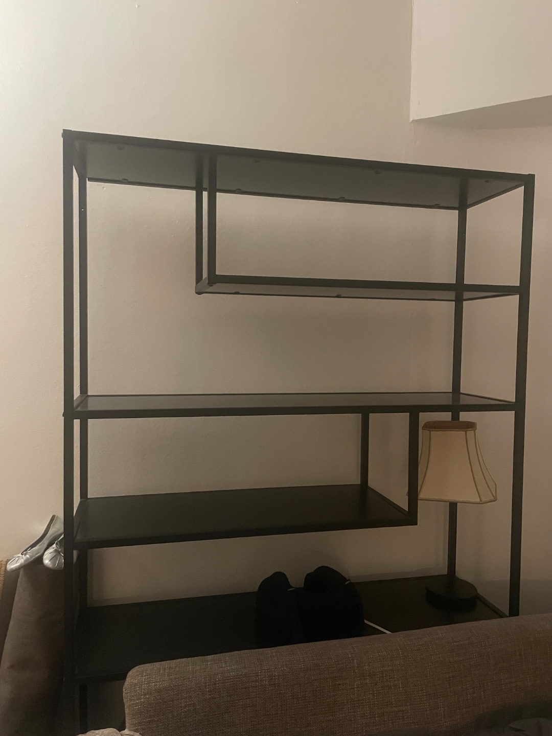 Black metal shelving unit available for free! First photo is what it looks like assembled. All parts are there.