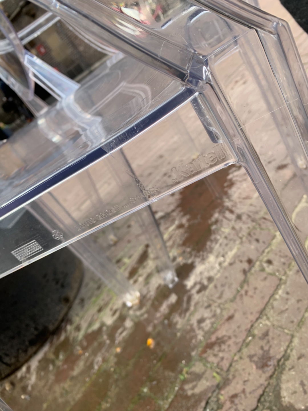 2 Kartell chairs. Both have small cracks