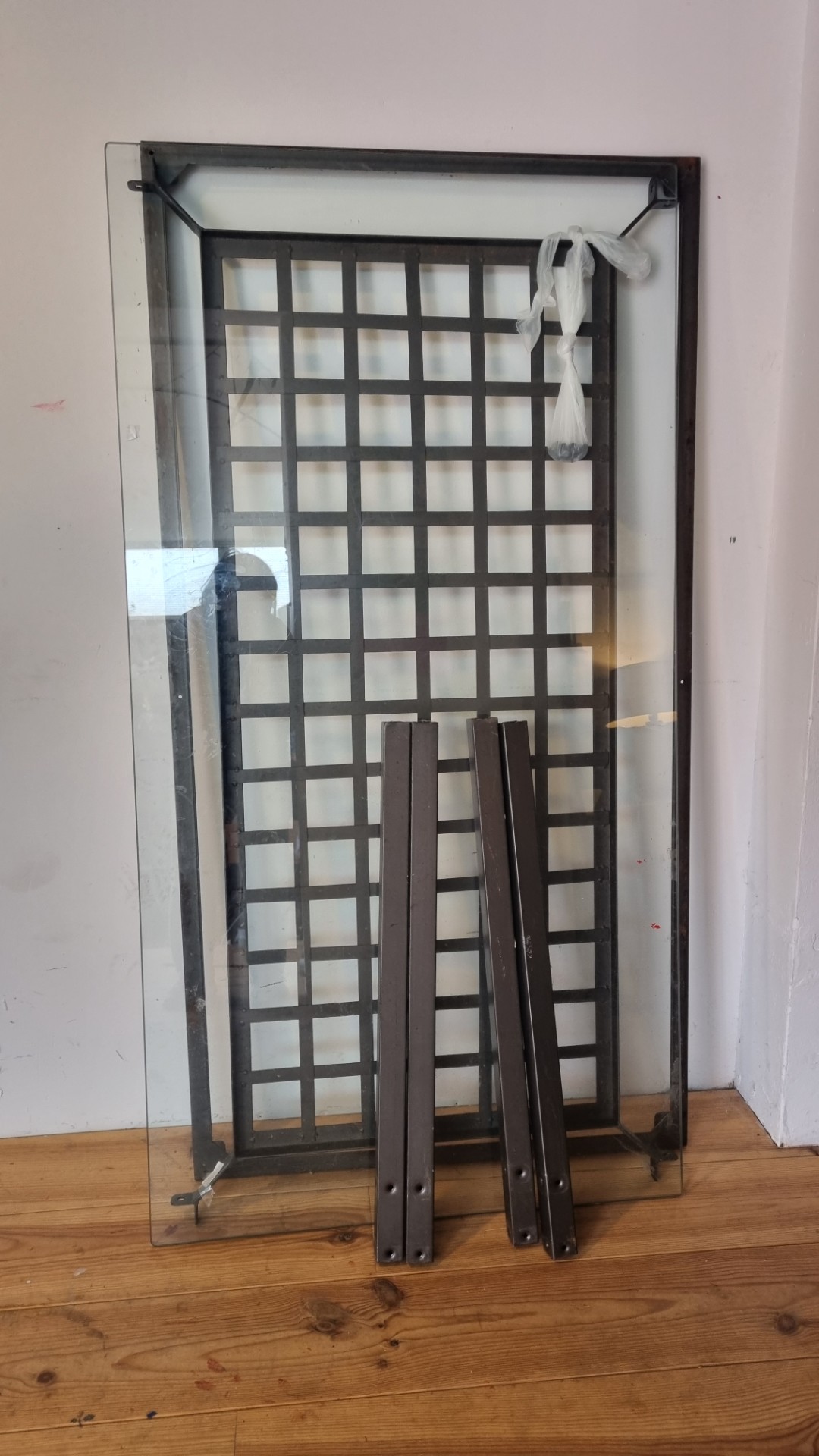 Big and heavy coffee table from glass and steal (or iron?). Pick up at sijsjesstraat 21b. App me if you are interested 1