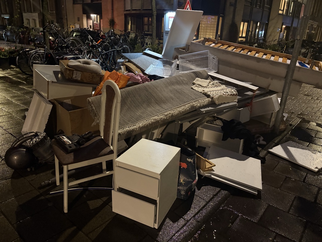 a nightstand, a chair, a mini trash can 3