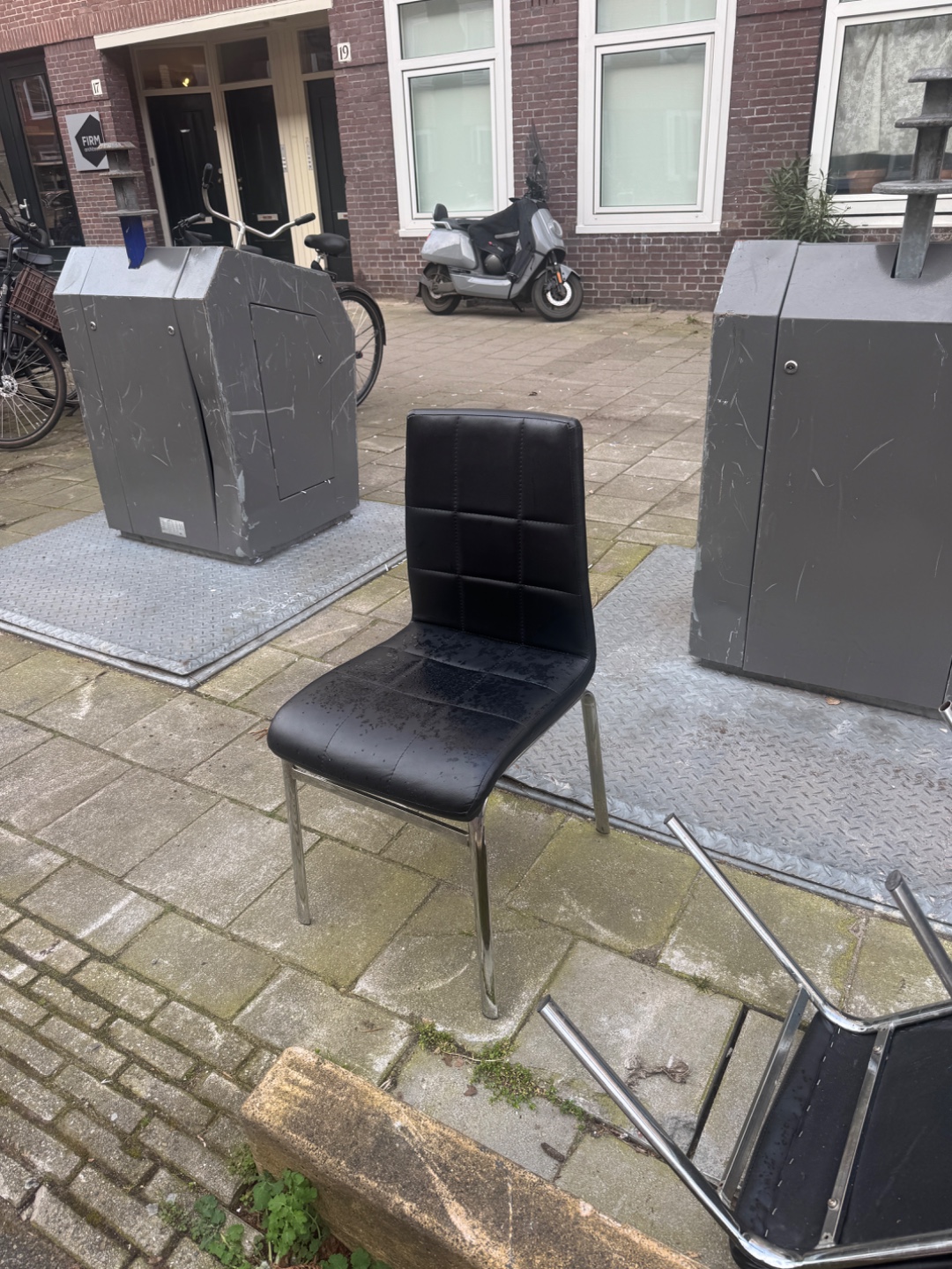 3 black leather chairs with chrome 1