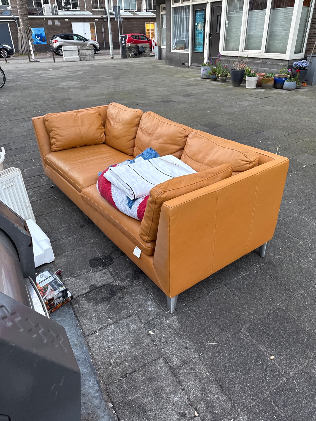 Really good looking leather couch, complete with all the cushions 1