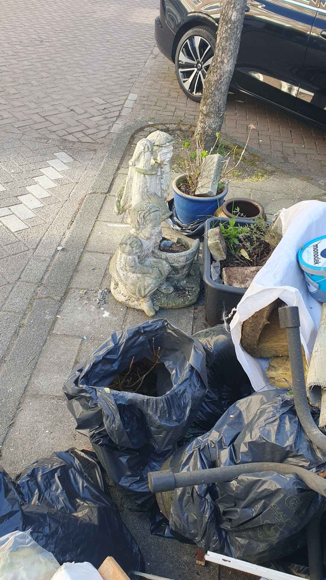 wood, plants and pots, statue, paint stuff, statue, small garden table and more 2