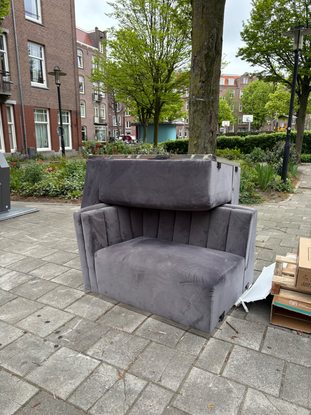 Grey velvet couch with silver trip 1