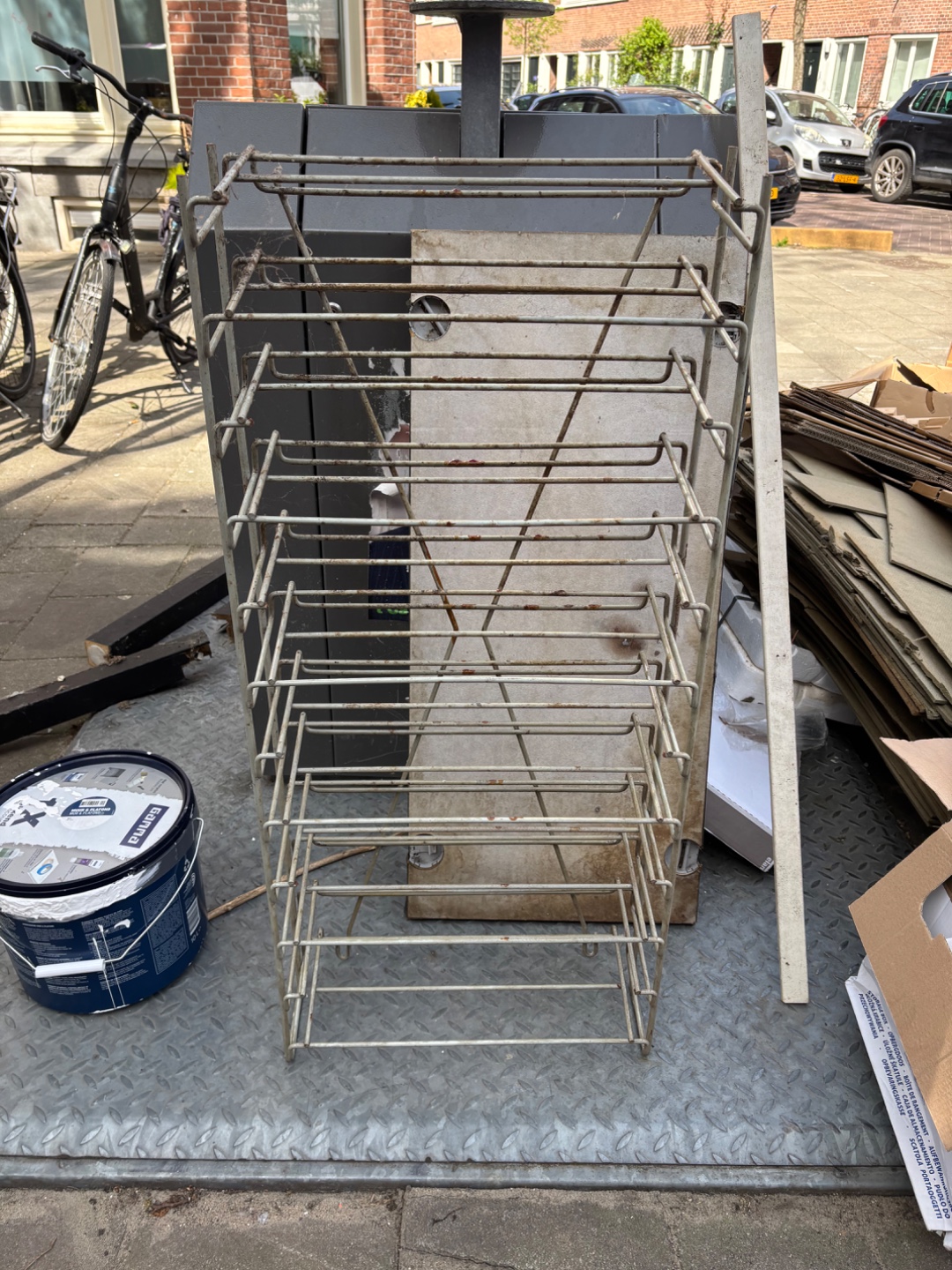 Shoe rack? Definitely old, indestructable/ solid steel. Needs refinishing. 1
