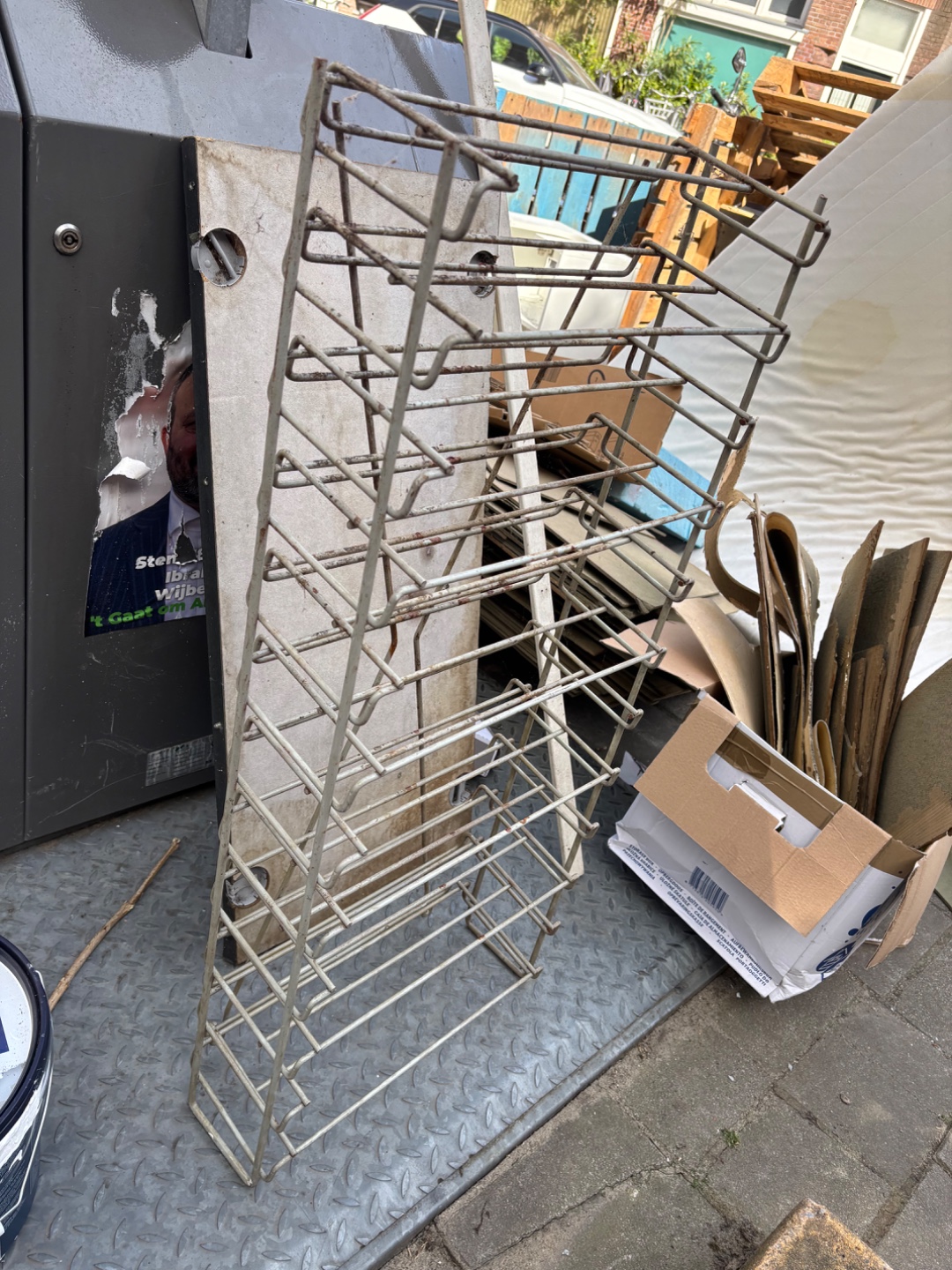Shoe rack? Definitely old, indestructable/ solid steel. Needs refinishing. 2
