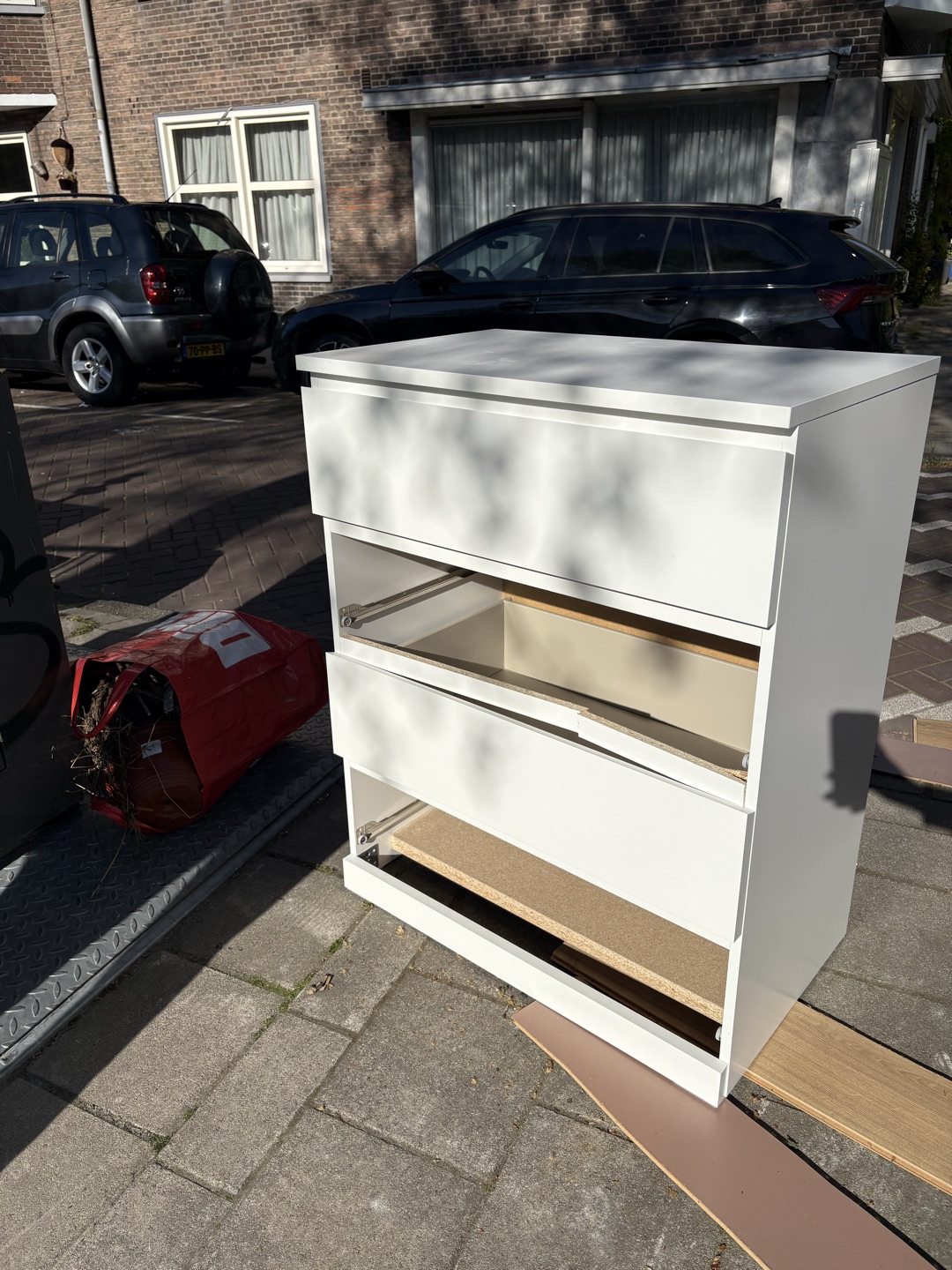 Malm dresser missing 2 drawers 1