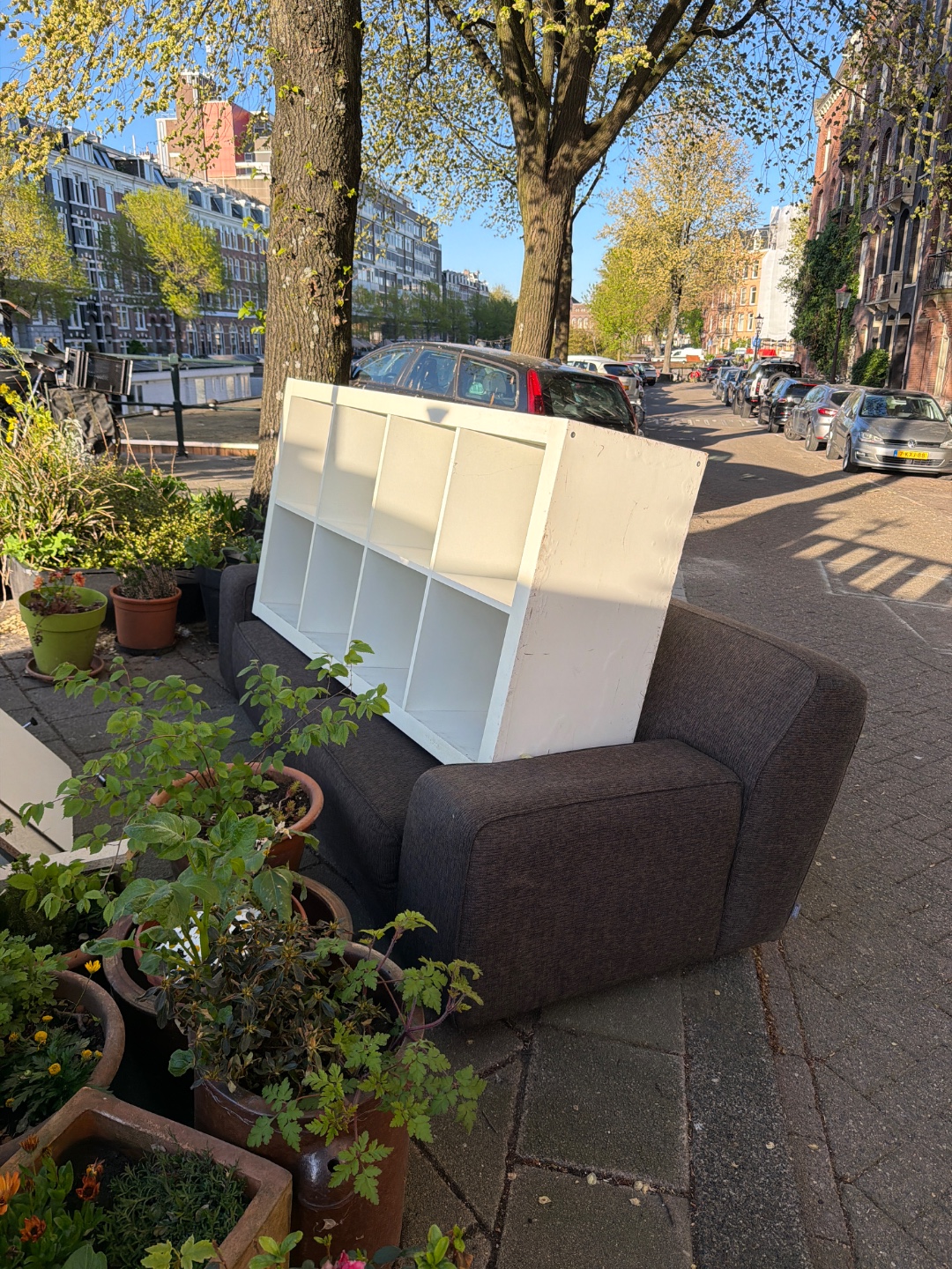 Shelves (IKEA kallax), sofa, 2x chairs, table, lamp 1