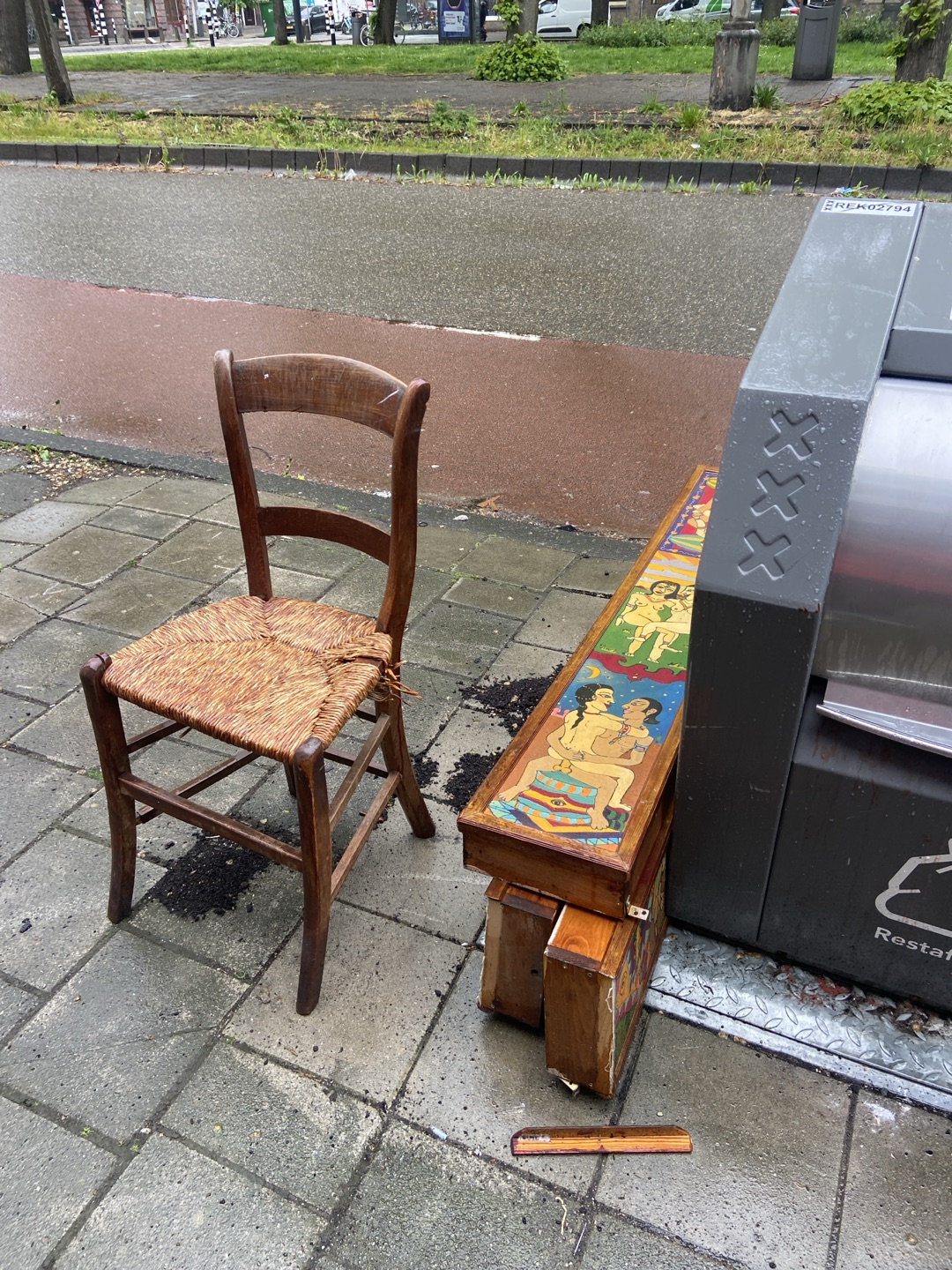 Wooden chair, and interesting (kamasutra?) light boxes. 2