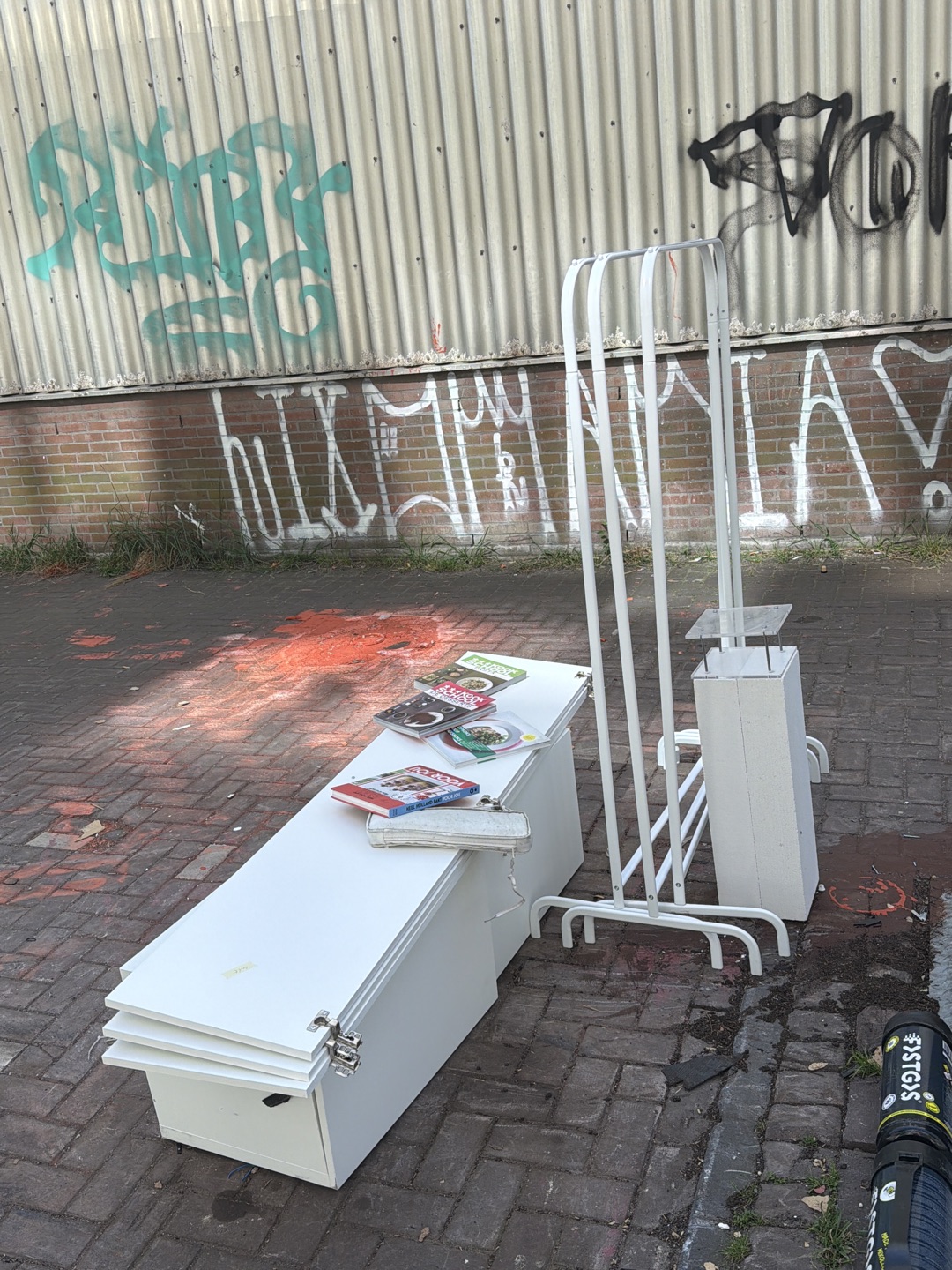 3x clothing rack, cookbooks, ikea doors (?) 1