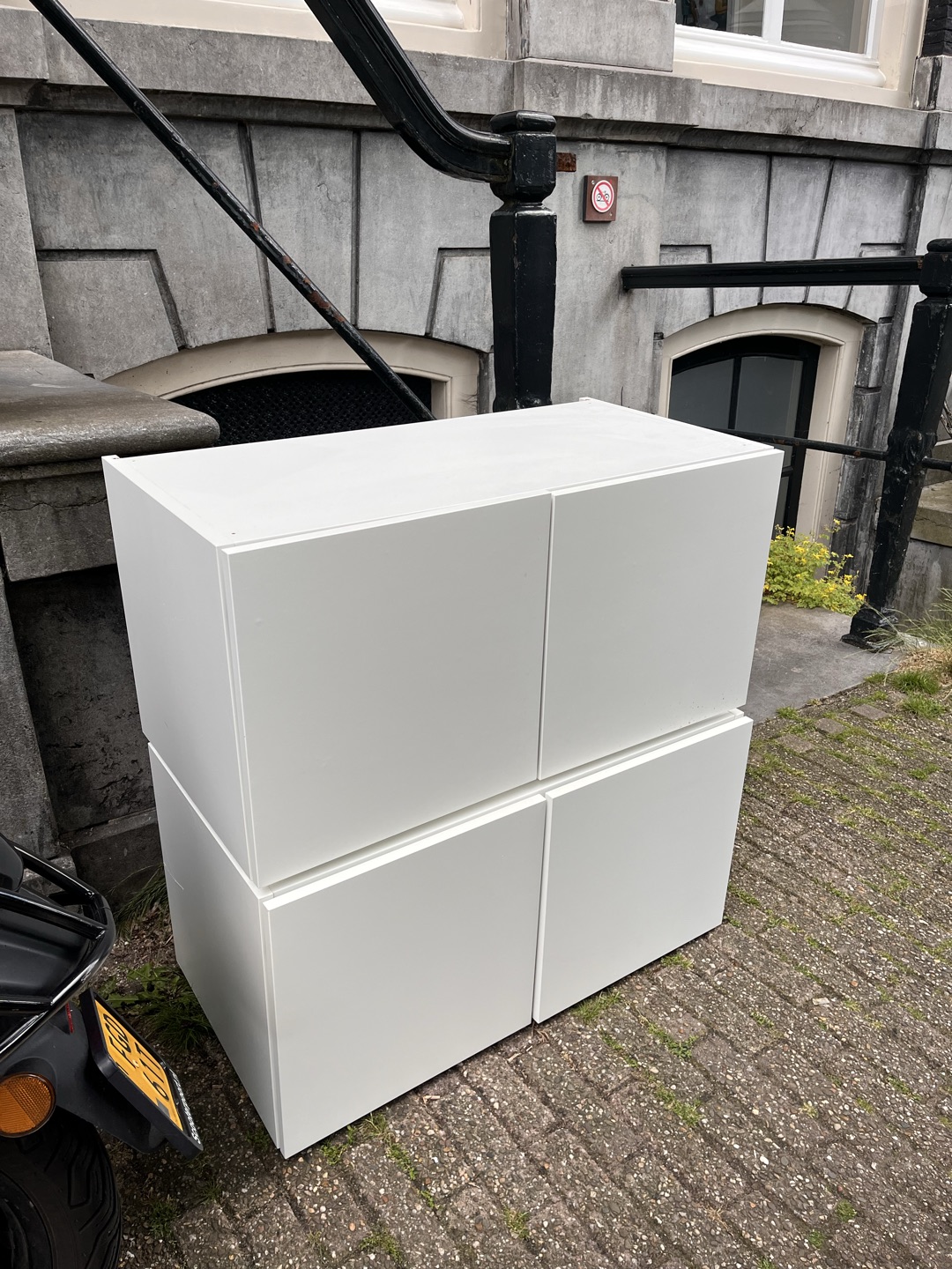 2 white storage units 1