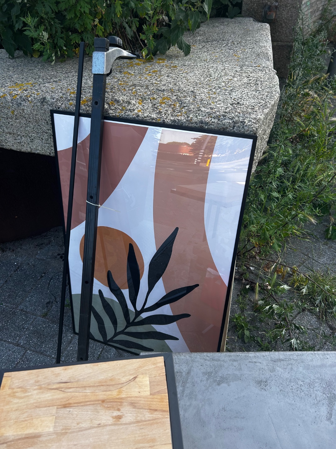 Tv cabinet, small table and large black poster frame 2