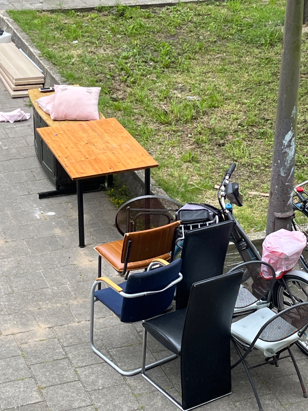 1 L couch with adjustable head and arm rests, 4 dining chairs, 1 table, 1 granite topped media console, 2 outdoor chairs, 1 outdoor table, 1 dart board 2