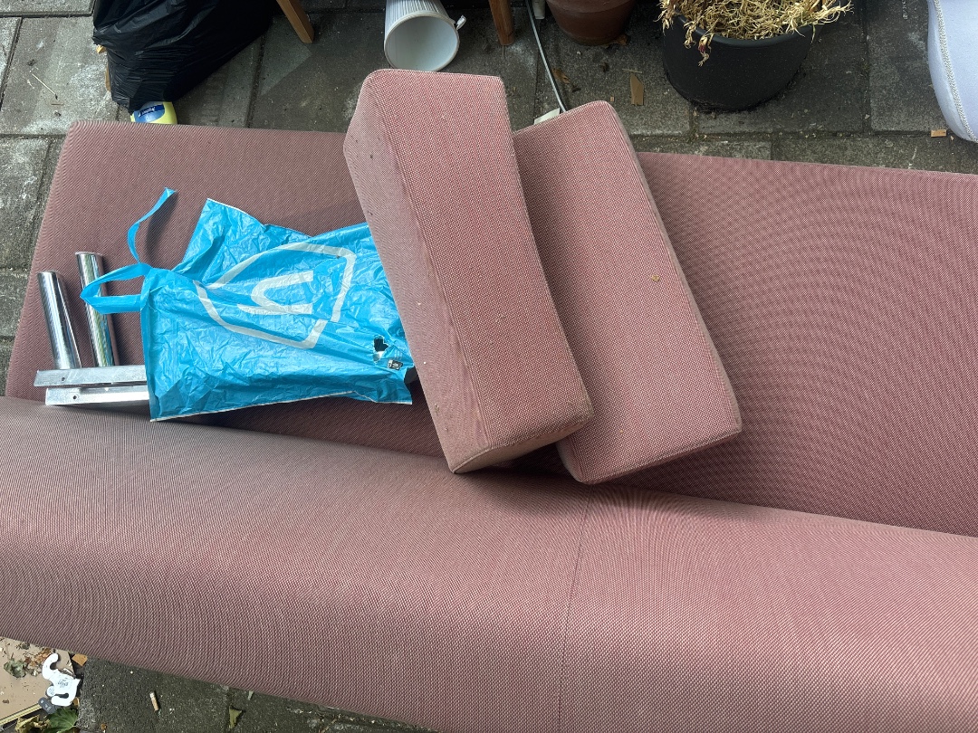Pink couch with everything 2