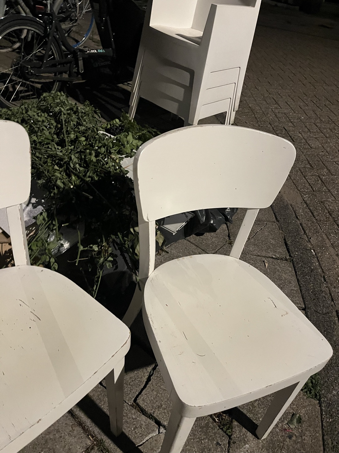 Three indoor wooden chairs and four outdoor plastic chairs, all good condition 1
