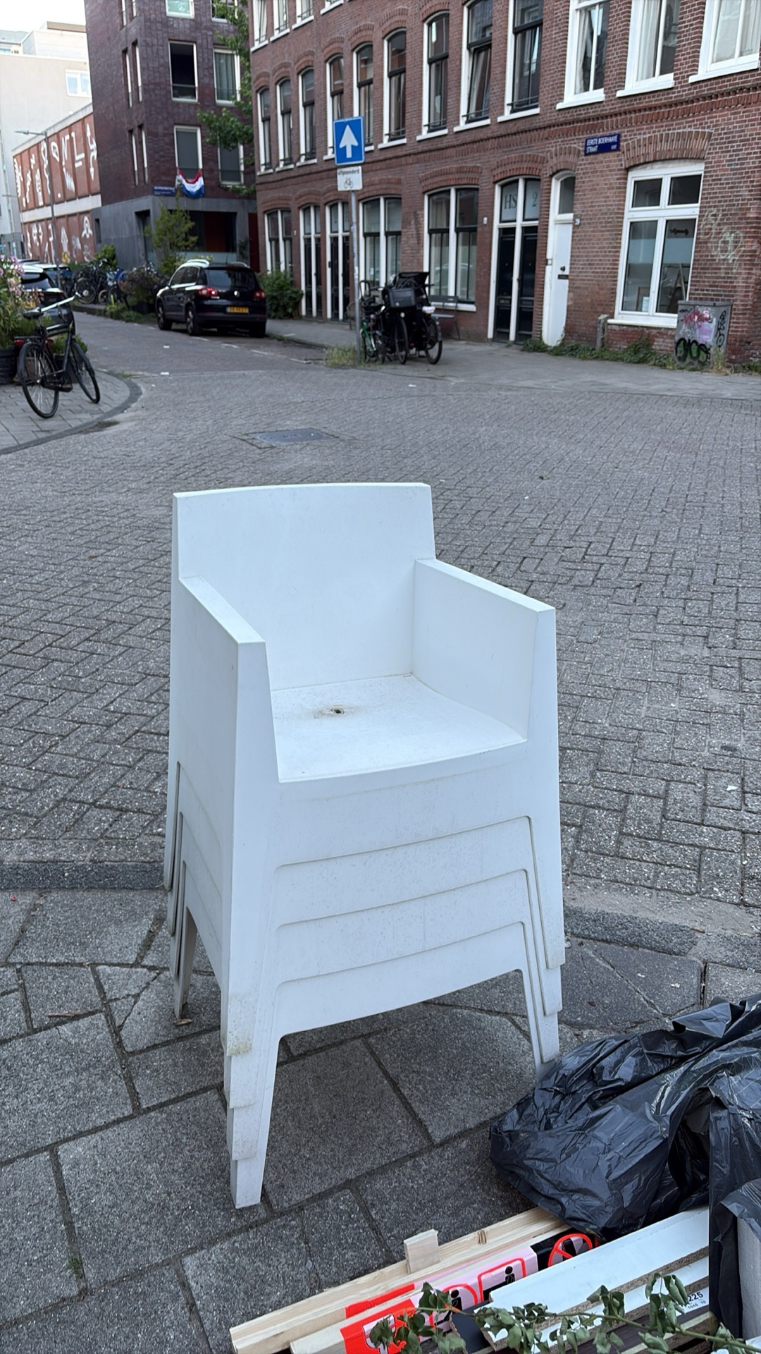 Three indoor wooden chairs and four outdoor plastic chairs, all good condition 3
